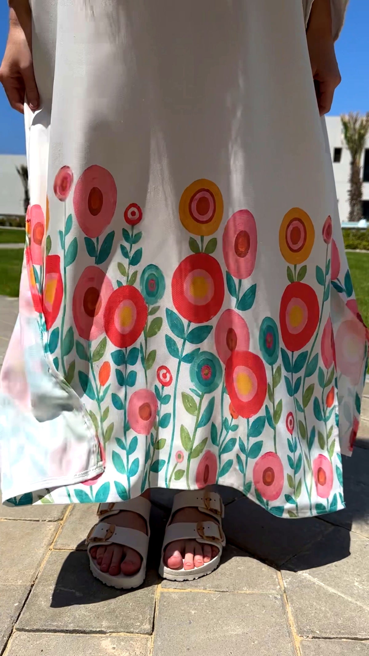 Célora floral kaftan dress showing the drape of the linen